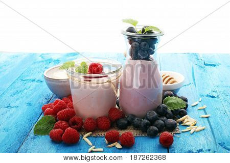 Beautiful Appetizer Pink Raspberries Fruit Smoothie Or Milk Shake In Glass Jar With Berries Backgrou