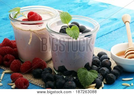 Beautiful Appetizer Pink Raspberries Fruit Smoothie Or Milk Shake In Glass Jar With Berries Backgrou