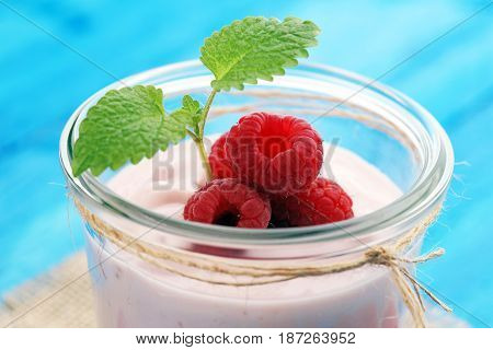 Beautiful Appetizer Pink Raspberries Fruit Smoothie Or Milk Shake In Glass Jar With Berries Backgrou