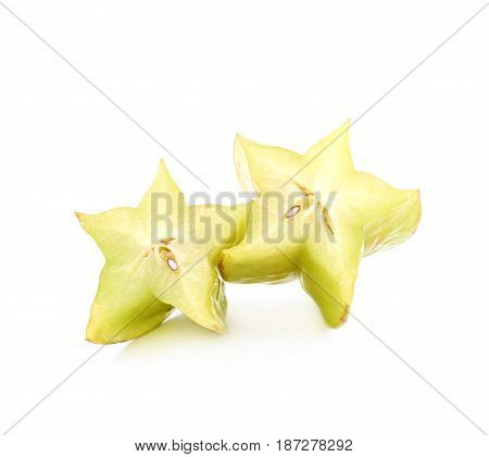 Sliced carambola starfruit fruit isolated over the white background