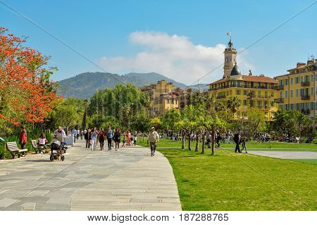 People Walking And Relaxing At Promenade Du Paillon