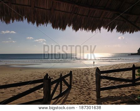 Sunset on secluded beach in San Juan del Sur Nicaragua