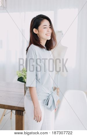 Portrait Of Beautiful Asian Girl With Beautiful Clothing And Relex Posting.