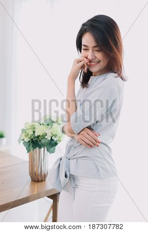 Portrait Of Beautiful Asian Girl With Beautiful Clothing And Relex Posting.