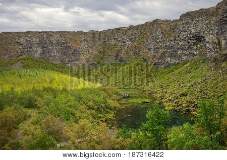 Asbyrgi Canyon In Jokulsargljufur National Park And Green Lake With Refflection, Iceland