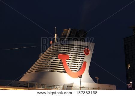 Amsterdam The Netherlands - May 11th 2017: Mein Schiff 3 TUI Cruises docked at Passenger Terminal Amsterdam funnel with logo