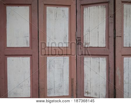 Detail of a closed wooden door. Detail of a closed wooden door.