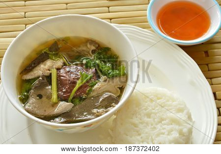 boiled pork blood and entrails soup eat couple with rice on dish