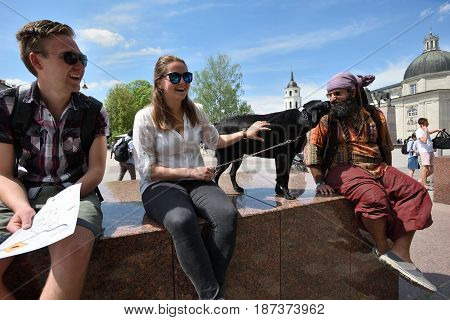 VILNIUS - MAY 20: Unidentified people in Vilnius Old Town on May 20 2017 in Vilnius Lithuania. Vilnius is the capital of Lithuania and its largest city.