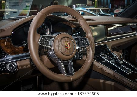 STUTTGART GERMANY - MARCH 04 2017: Interior of the full-size luxury car Porsche Panamera Turbo 2016. Europe's greatest classic car exhibition 