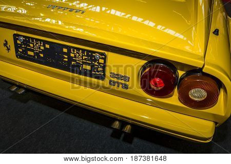 STUTTGART GERMANY - MARCH 04 2017: Fragment of sports car Ferrari 328 GTS. Rear view. Europe's greatest classic car exhibition 