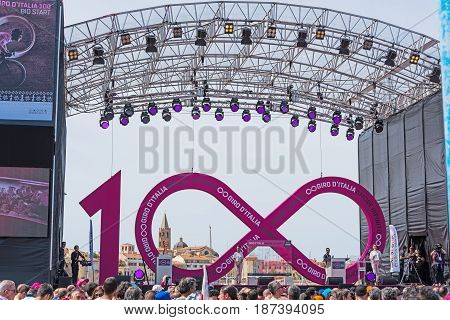 Alghero Italy - May 05 2017: Stage of 100th Giro d'Italia opening day with Alghero old town in the background
