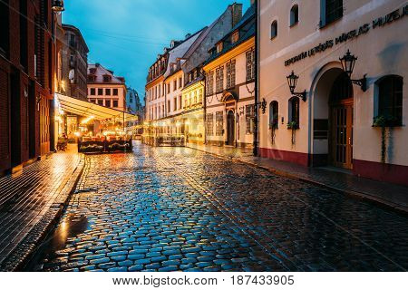 Riga, Latvia - July 3, 2016: The Museum Of Decorative Arts And Design MDAD And Cafe In Lighting At Evening Or Night Illumination In Old Town In Skarnu Street