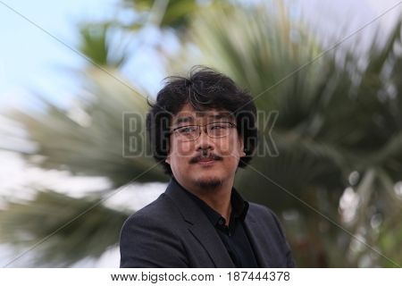 Bong Joon-Ho attends the 'Okja' photocall during the 70th annual Cannes Film Festival at Palais des Festivals on May 19, 2017 in Cannes, France. 