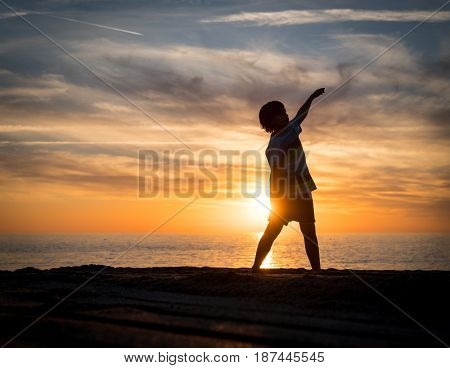 Happy boy enjoying the beach