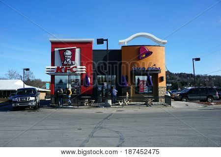 BAY VIEW, MICHIGAN / UNITED STATES - NOVEMBER 26, 2016: One may eat fried chicken at KFC, and tacos at the Taco Bell restaurant.