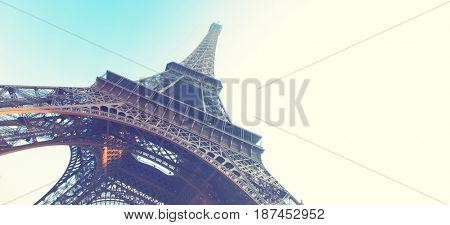 Angle shot of The Eiffel Tower in Paris, France. Retro style image. Copyspace composition