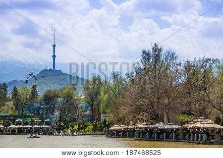 Central City Park, Almaty, Kazakhstan. View Of The Lake And Kok Tobe Hill
