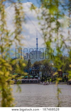 Central City Park, Almaty, Kazakhstan. View Of The Lake And Kok Tobe Hill