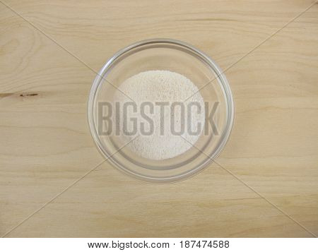 Prebiotic ingredient inulin powder in glass bowl