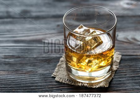 Glass Of Rum On The Wooden Background
