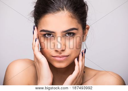 Beauty Woman Face Portrait Close Up. Beautiful Model Girl With Perfect Fresh Clean Skin On Grey