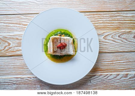 Atlantic hake over dried tomato ratatouille recipe