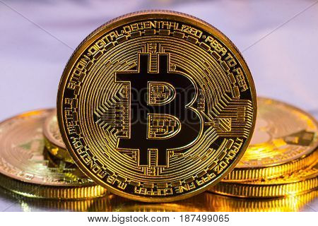 Cryptocurrency Physical Golden Bitcoin Coin On Colorful Background