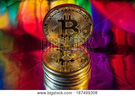 Cryptocurrency Physical Golden Bitcoin Coin On Colorful Background