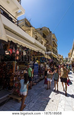 HERAKLION GREECE - JULY 09 2016: Crete. The popular market and shopping street №1866 in the historic center of the city. Heraklion - the largest city on the island.