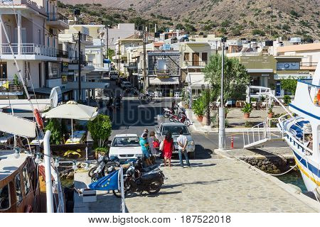 CRETE GREECE - JULY 11 2016: The embankment of a small elite tourist town - Elounda municipality of Agios Nikolaos.