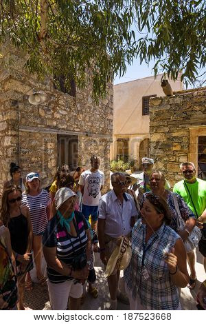 CRETE GREECE - JULY 11 2016: Tourists on Spinalonga island and fortress of the same name. Tourists on tours in the fortress.
