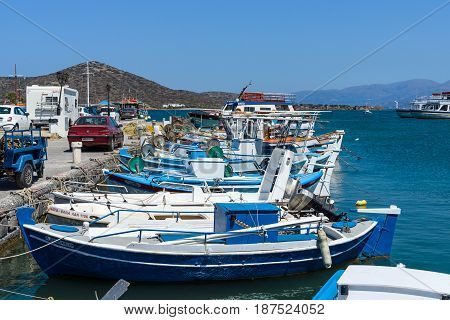 CRETE GREECE - JULY 11 2016: The embankment of a small elite tourist town - Elounda municipality of Agios Nikolaos.