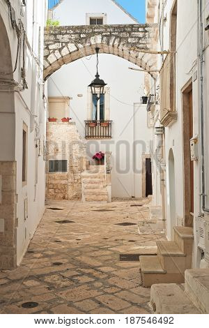 Characteristic alleyway of Locorotondo. Puglia. Southern Italy.