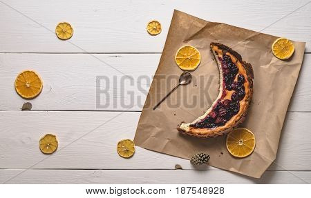 Top View Of Cheesecake In The Visible Moon Lemons On White Boards