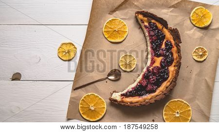 Top View Of Cheesecake In The Visible Moon Lemons On White Boards