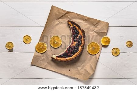 Top View Of Cheesecake In The Visible Moon Lemons On White Boards