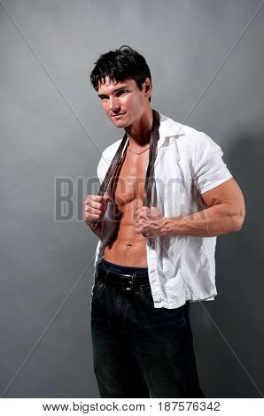The hot sexy stud is looking very buff.