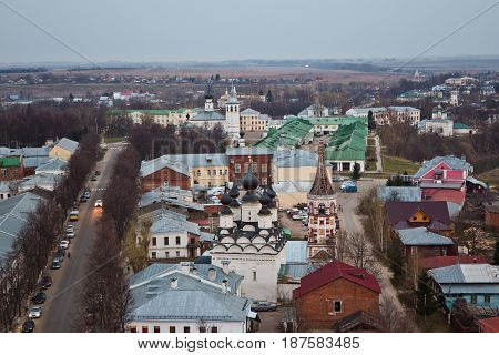 Evening old Suzdal cityscape from rooftop. Churches, monasteries and old houses