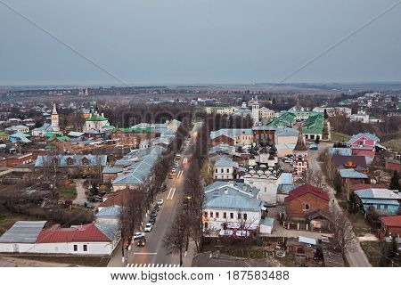 Evening old Suzdal cityscape from rooftop. Churches, monasteries and old houses
