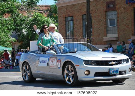 JULY 7, 2014.  CASPER, WY.  CIRCA:  Wyoming governor Matt Mead and wife Carol leading the parade day in Casper, Wy.