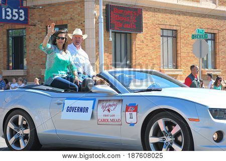 JULY 7, 2014.  CASPER, WY.  CIRCA:  Wyoming governor Matt Mead and wife Carol leading the parade day in Casper, Wy.