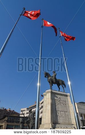 Ankara, Turkey - APRIL 27, 2017: The statue of Ataturk and national flags of modern Turkey in Ulus - Ankara, Turkey
