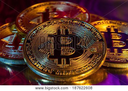 Cryptocurrency Physical Golden Bitcoin Coin On Colorful Background