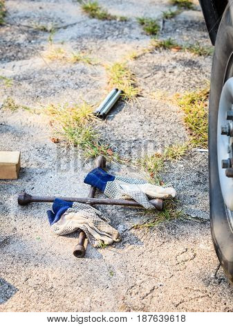 Socket Wheel Wrench And Jack Lying On Ground