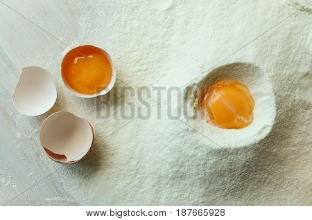 Preparation of ingredients for baking. View from above. Ingredients for baking. (Eggs flour)
