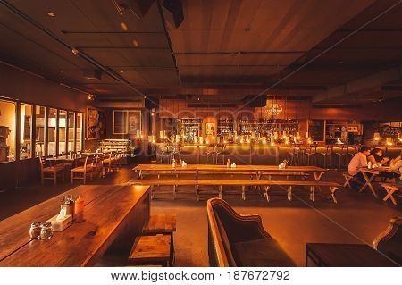 BANGALORE, INDIA - FEB 14, 2017: Visitors of Arbor Brewing Company restaurant having rest with drinks on February 14, 2017. With population 8.52 million Bangalore is the third most populous indian city