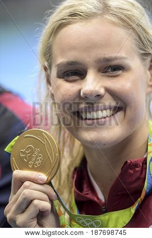 Rio de Janeiro Brazil - august 13 2016: Pernille Blume (DEN) gold metal during medal ceremony after Women's 50 metre freestyle of the Rio 2016 Olympics