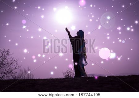  Copy space of silhouette woman rising hands on sunset sky double exposure colorful bokeh and bird fly background. Vintage tone filter effect color style.