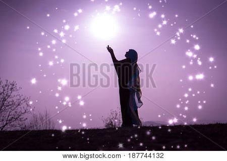  Copy space of silhouette woman rising hands on sunset sky double exposure colorful bokeh and bird fly background. Vintage tone filter effect color style.